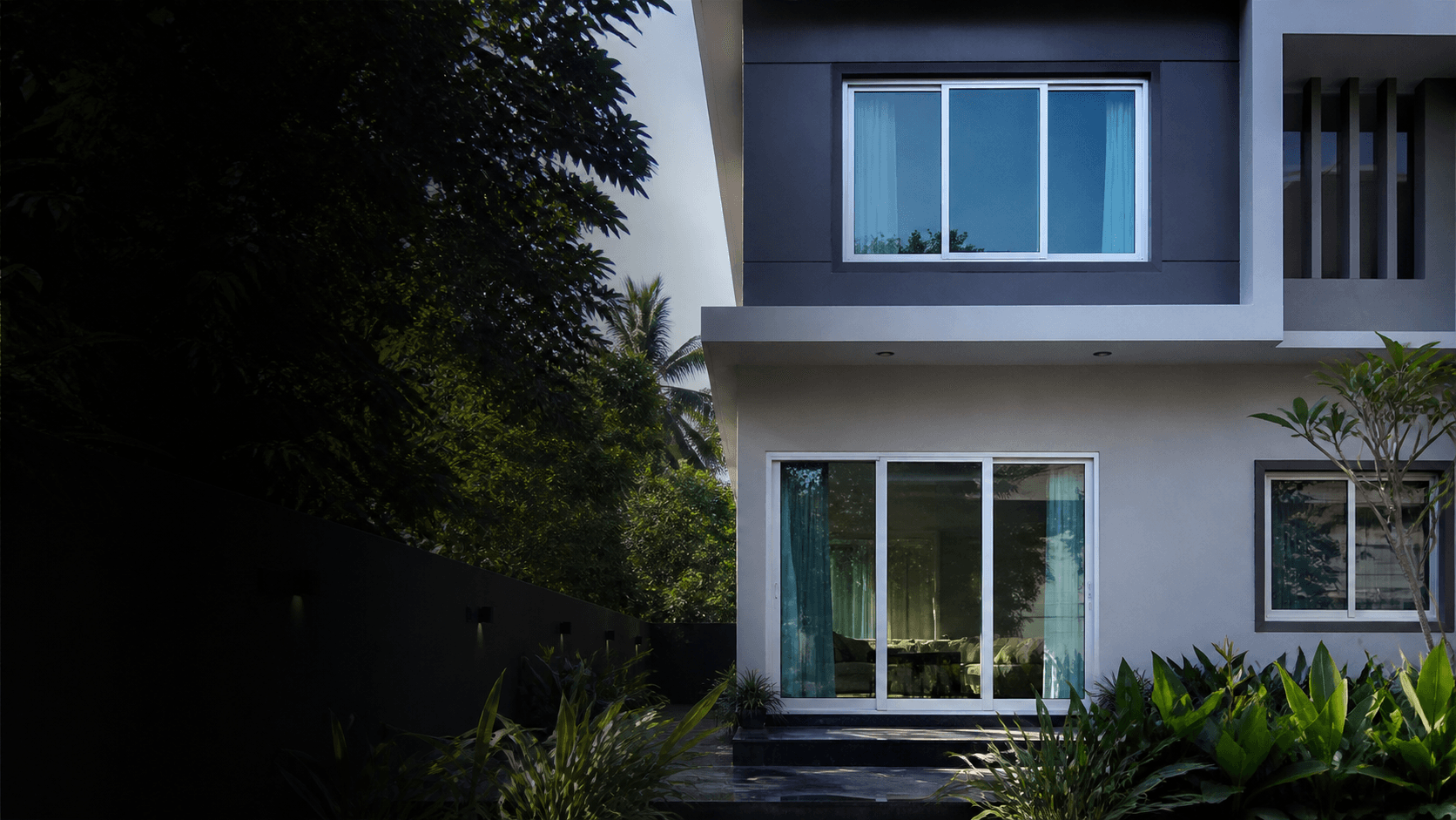 Contemporary home with large UPVC windows and a glazed sliding door